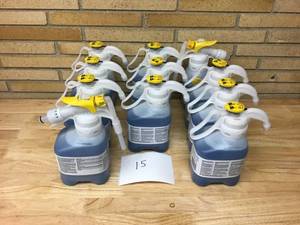lot 15 image: SEALED AIR DIVERSEY lot of 11 1.5L Jugs Glass & Multi Surface Cleaner