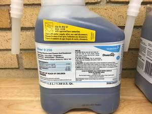 lot 16 image: SEALED AIR DIVERSEY Mixed lot of 7 1.5L jugs - 2 neutral cleaner, 2 glass & Multi Surface and 3 disinfectent