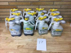 lot 17 image: SEALED AIR DIVERSEY Mixed Lot of 12 Jugs - 4 Multi Surface Disinfectant - 2 degreaser - 3 disinfectant - 2 glass - 1 restroom floor