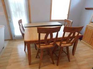 lot 15 image: Dining table and Chairs