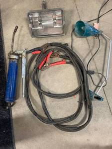 lot 18 image: Jumper Cables, Grease Gun, & 2 Lights