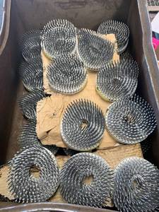 lot 34 image: Metal Box with Coil Nail 15 x 24