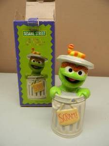 lot 20 image: SESAME STREET SALT & PEPPER SHAKERS - OSCAR THE GROUCH IN THE GARBAGE CAN - NEW IN BOX - SEE PICTURES