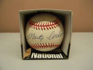 lot 30 image: MINNESOTA TWINS MARTY CORDOVA SIGNED BASEBALL - AL ROOKIE OF THE YEAR 1995 - SEE PICTURES