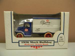 lot 51 image: ERTL 1926 Mack Bulldog Delivery Truck Bank Diecast 138 Scale - 65TH Anniversary - NEW IN BOX - SEE PICTURES