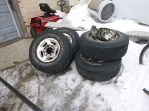 lot 7 image: 4 Toyo AT Open Country Tires with Hub Caps