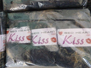 lot 142 image: 12 Packs of Red Heart Kissy Yarn and Sewing Kit