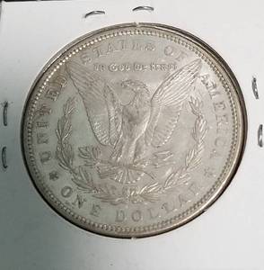 lot 69 image: 1890 MORGAN SILVER DOLLAR AU