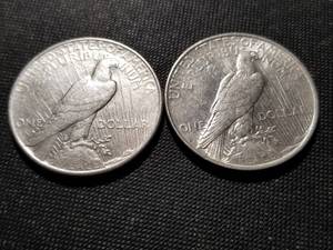 lot 113 image: 2 PEACE SILVER DOLLARS AS PICTURED