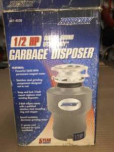 lot 17 image: Barracuda Garbage disposal - 12 HP
