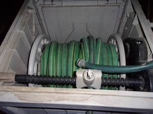 lot 21 image: Suncast Hose Reels & Storage Box