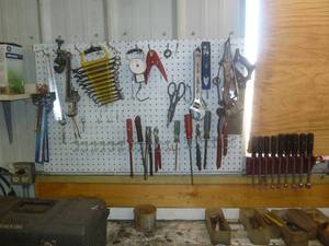 lot 77 image: Assorted Tools On Peg Board