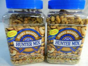 lot 79 image: 2 New Containers of Honey Roasted Hunters Mix