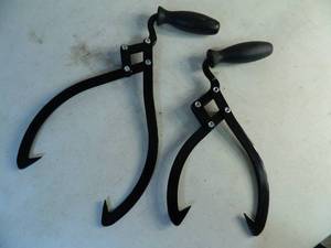 lot 117 image: 2 Sizes of New Firewood Tongs