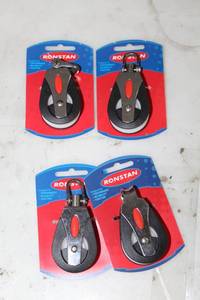 lot 280 image: Lot of (4) Ronstan 40mm Single Block RF41100, 40mm Single Loop Top RF41101