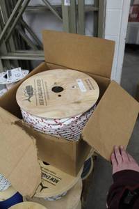 lot 38 image: New England Ropes 12in. Sta-Set Red Fleck Rope 600 Foot Reel