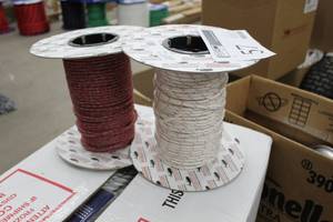lot 57 image: Lot of (2) New England Ropes 316in. Sta-Set Double Braid Rope 600 Foot Reel, 5mm Enduro Red Mottled Rope 600 Foot Reel