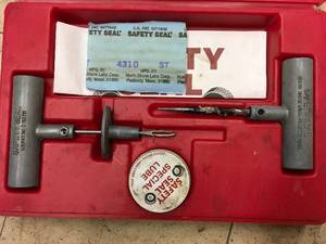 lot 390 image: Tire Safety Seal Kit