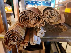 lot 18 image: Pile of Used Wood and Plastic Window Blinds