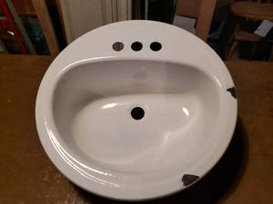 lot 34 image: Chipped Enamel 19 Round Sink