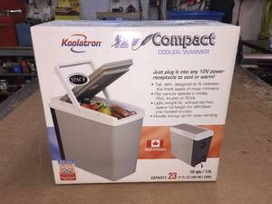 lot 24 image: 12 V plug in cooler  warmer NIB