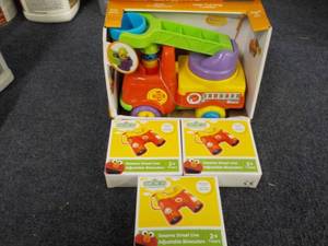 lot 9 image: Fun time Fire Engine and 3 Sesame S...
