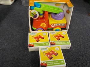 lot 10 image: Fun time Fire Engine and 3 Sesame S...