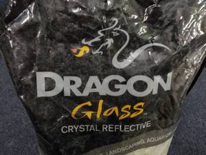 lot 62 image: 10 lb. Bag Dragon Glass Crystal Ref...