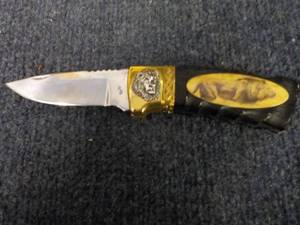 lot 256 image: Stainless Lion Knife...