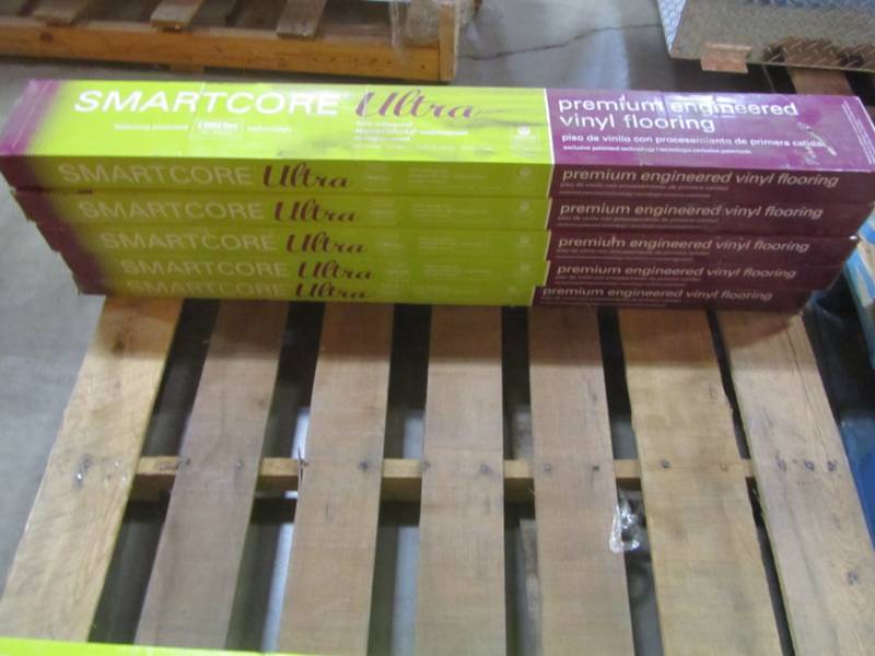 lot 129 image: (5 CASES) SMARTCORE Ultra 8-Piece 5.91-in x 48.03-in Columbia Oak Luxury Vinyl Plank Flooring LX42000606