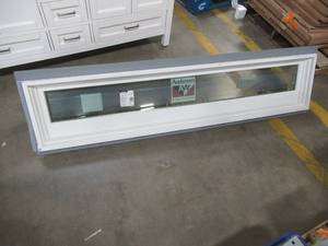 lot 246 image: Andersen Custom Fixed Window. White Vinyl Exterior. Unfinished Pine Interior.  Measures Approximately 67 18 X 14 12 X 6 916.