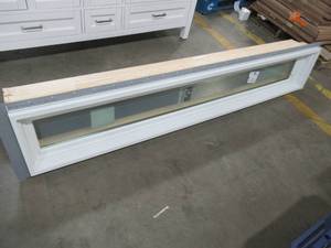 lot 247 image: Andersen Custom Fixed Window. White Vinyl Exterior. Unfinished Pine Interior.  Measures Approximately 72 78 X 12 X 6 916