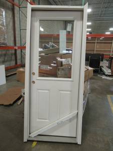 lot 249 image: Therma-Tru Benchmark Doors 12 Lite Fiberglass 2-Panel 32 X 80 Pre-Hung Door With Brick Mold.