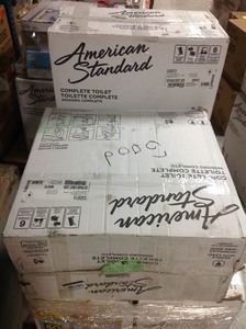 Large pallet lot of 4 good inspected and complete toilets new open box American standard