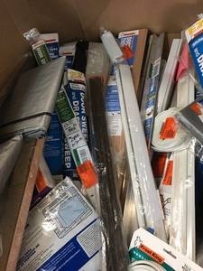 Gaylord with assorted Door Thresholds, air conditioner covers, window sealers and more condition ranges from new to good condition not inspected some maybe missing parts