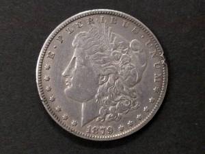 lot 5 image: 1879 Morgan Silver Dollar...