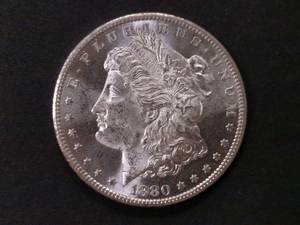 lot 8 image: 1880 S MS Morgan Silver Dollar...