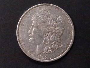 lot 15 image: 1883 O Morgan Silver Dollar...