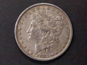 lot 16 image: 1884 Morgan Silver Dollar...