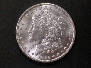 lot 17 image: 1884 O High Grade Morgan Silver Dol...