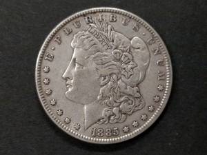 lot 18 image: 1885 Morgan Silver Dollar...