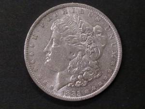 lot 19 image: 1885 O Morgan Silver Dol...