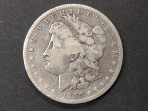lot 20 image: 1885 S Morgan Silver Dollar...