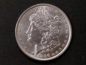 lot 21 image: 1886 High Grade Morgan Silver Dolla...