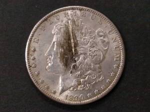 lot 25 image: 1890 Morgan Silver Dollar...