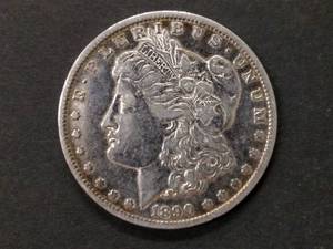 lot 27 image: 1890 O Morgan Silver Dollar...