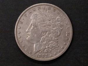 lot 29 image: 1892 O Morgan Silver Dollar...