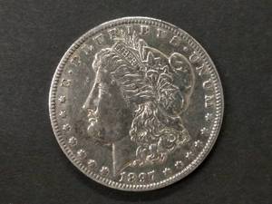 lot 33 image: 1897 O Morgan Silver Dollar...