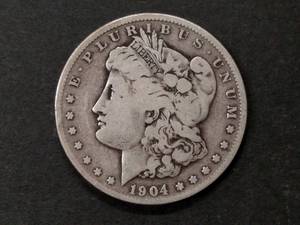 lot 38 image: 1904 S Morgan Silver Dollar...