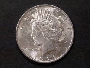 lot 70 image: 1923 AU Peace Silver Dollar...